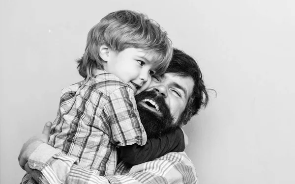 Love you dad. father and son embrace. happy family leisure. small boy hug dad. love to be together. child development. You are my world. You do not want to hug with daddy. Pure happiness. Baby care