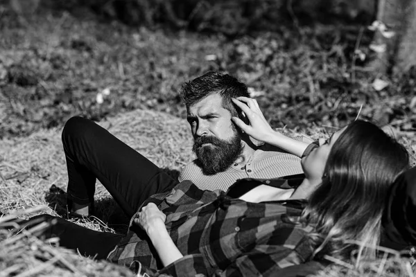 Girl and bearded guy or happy lovers on a date — Stock Photo, Image