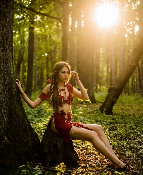 Female spirit mythology. She belongs tribe warrior women. Wild attractive woman in forest. Folklore character. Living wild life untouched nature. Sexy girl. Wild human. Wilderness of virgin woods