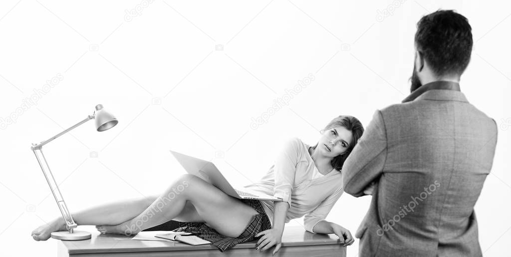 Its more than just flirtation. Flirtatious girl. Gorgeous businesswoman enjoying flirtation with business partner. Sexy secretary doing little flirtation with boss in office. Flirtation and intrigue