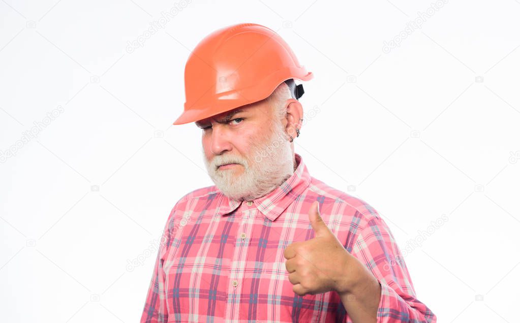 thumbs up to success. man builder isolated on white. professional skills. build and construction. professional repairman in helmet. architect repair fix. engineer worker career. mature bearded man