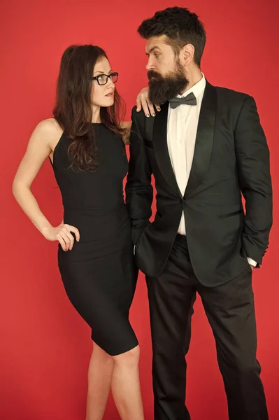 Official event concept. Man bearded wear tuxedo girl elegant dress. Formal dress code. Visiting event or ceremony. Couple classy clothes. Elite event. Main rules picking clothes. Corporate party