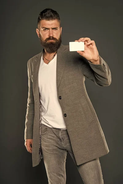 Business fashion and dress code. confident businessman in suit. Bearded man. Male formal fashion. Businessman with credit card. Brutal man with hipster beard. Mature. Business coach