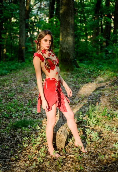 Forest fairy. Living wild life untouched nature. Wild attractive woman in forest. Sexy girl. Wild human. Female spirit mythology. Fashion and culture. Wilderness of virgin woods. Folklore character