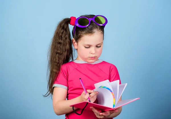 Top funny books to read. Beach reads for summer. Child likes reading book. Popular vacation books. Literature concept. Great books for summer vacation. Girl in sunglasses hold book. Hobby and leisure