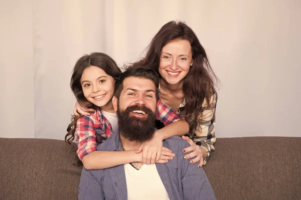 Family bonds. Family spend weekend together. Friendly family having fun together. Mom dad and daughter relaxing on couch. Happy parenthood. Close and trustful relations. Family values concept — Stock Photo, Image