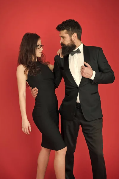 Award ceremony concept. Bearded gentleman wear tuxedo girl elegant dress. Formal dress code. Visiting event or ceremony. Couple ready for award ceremony. Corporate party. Gorgeous couple in love