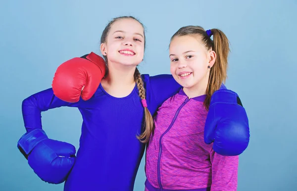Morning workout. Happy children sportsman in boxing gloves. Fitness diet. energy health. workout of small girls boxer in sportswear. punching knockout. Childhood activity. Sport success. Friendship