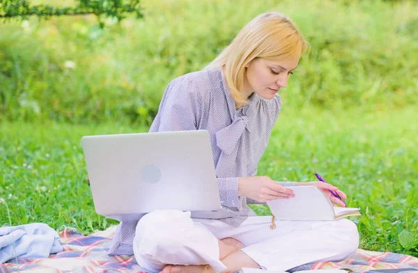 Guide starting freelance career. Business lady freelance work outdoors. Woman with laptop sit on rug grass meadow. Steps to start freelance business. Online or freelance career ideas concept