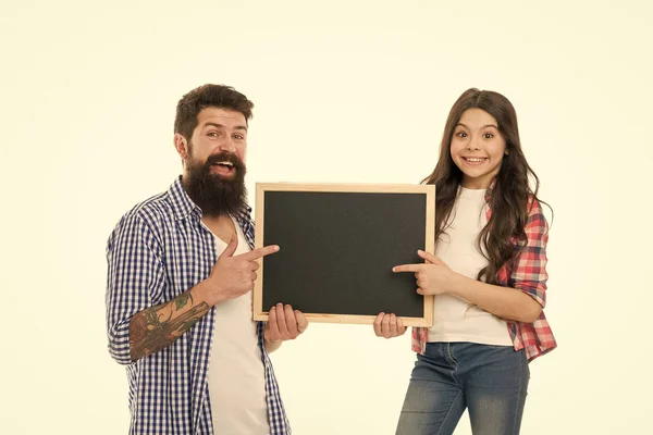 Father and daughter pointing at blank chalkboard. List things to do together. Child and father best friends. Parenthood and childhood. Fathers day concept. Lovely father and cute kid. Check this out — Stock Photo, Image