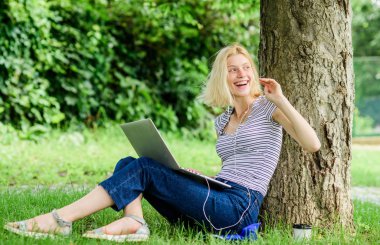 girl drink coffee to go. Relax in park. summer online. Morning chart. Pretty woman drinking takeaway coffee. modern woman with computer outdoor. girl work on laptop. Developing new approaches clipart