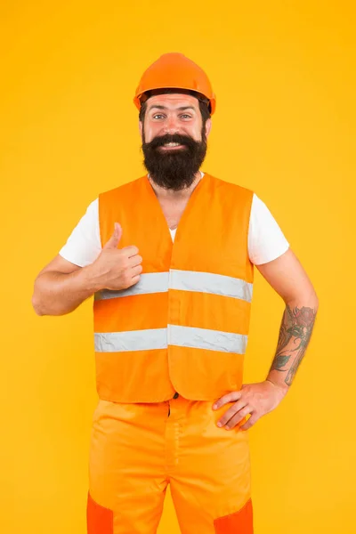 Καλή δουλειά. Άνθρωπος μηχανικός προστατευτική ομοιόμορφη πορτοκαλί φόντο. Φιλοσοφία καριέρας μηχανικού. Αρχιτέκτονας οικοδόμος. Ενδύματα ασφαλείας για την κατασκευαστική βιομηχανία. Γένια βίαιος χίπστερ μηχανικός ασφαλείας — Φωτογραφία Αρχείου