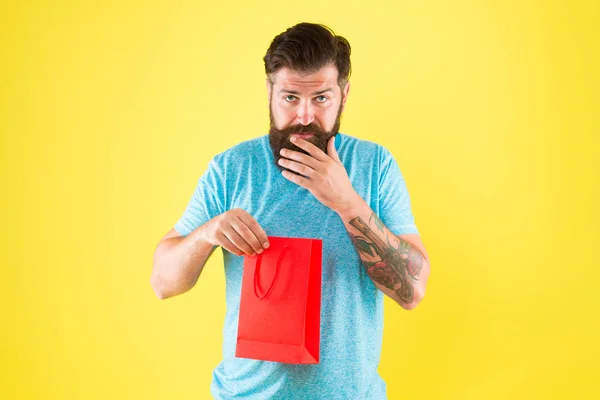 Shopping concept. Shop store mall boutique. Buy product. Aspects can influence customer decision making behavior. Happy hipster hold paper bag. Bearded man smiling with purchase. Impulse purchase — Stock Photo, Image