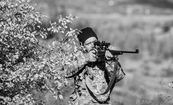 Man hunter with rifle gun. Boot camp. Bearded man hunter. Army forces. Camouflage. Military uniform. Hunting skills and weapon equipment. How turn hunting into hobby. Military Operation in Action — Stock Photo, Image