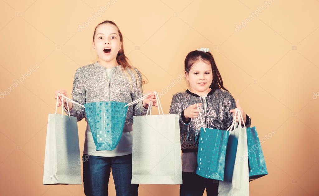 Girls Sisters Friends With Shopping Bags Beige Background Shopping And Purchase Black Friday Sale And Discount Shopping Day Children Hold Bunch Packages Kids Fashion Expect More Pay Less Larastock