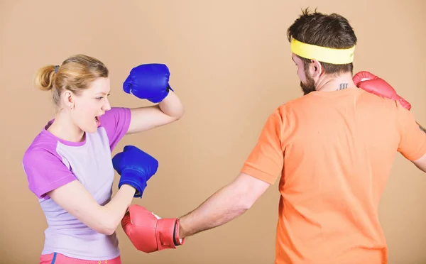 Defense wins championships. punching, sport Success. sportswear. Fight. Happy woman and bearded man workout in gym. training with coach. knockout and energy. couple training in boxing gloves — Stock Photo, Image