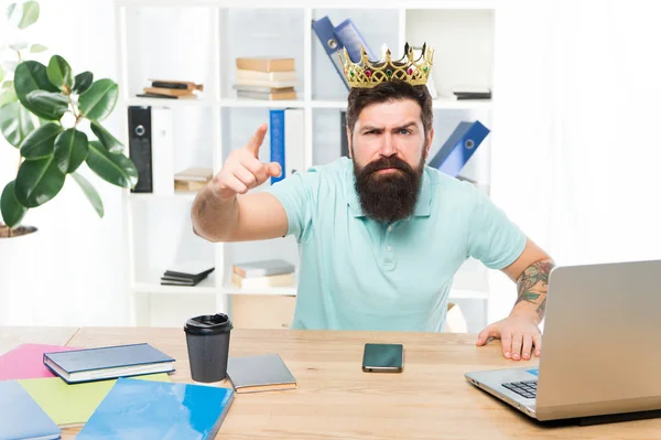 Issuing decree. Office is my kingdom. King of office. Man bearded businessman wear golden crown. Top manager head office. Boss enjoying glory. Head office and ceo concept. Chief executive officer