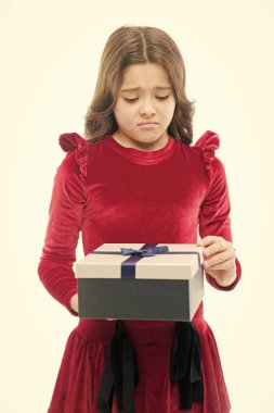 Happy birthday gift. sad small girl after shopping. big sale in shopping mall. Boxing day. Little girl with present box. Choosing the best. Oh no. Lovely dress. Hard choice. have no mood for shopping clipart