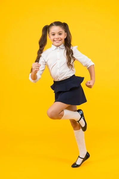 Keep going. Active child in motion. Freedom concept. Knowledge determined success. Active kid. Girl on way knowledge. Knowledge day. Back to school. Kid cheerful schoolgirl running. Pupil want study — Stock Photo, Image