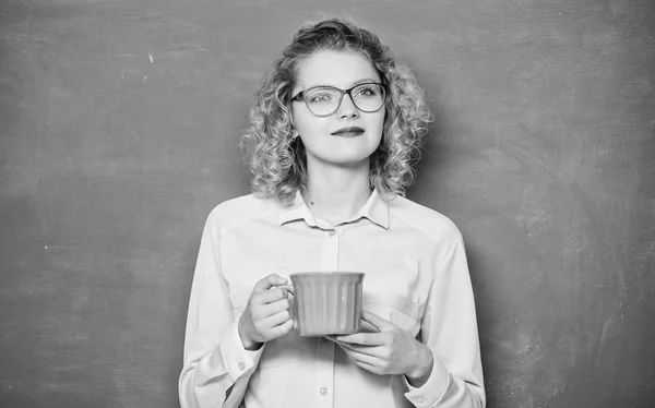 School teacher need coffee break. idea and inspiration. good morning. girl refreshing with tea drink. energy and vigor. replenishment of energy reserves. woman with coffee cup at blackboard — Stock Photo, Image