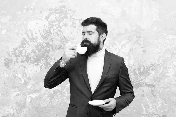 Best coffee served for him. Specialty coffee. Man handsome bearded businessman hold cup of coffee. Coffee break concept. Business people fashion style. Smart casual style clothes for office life