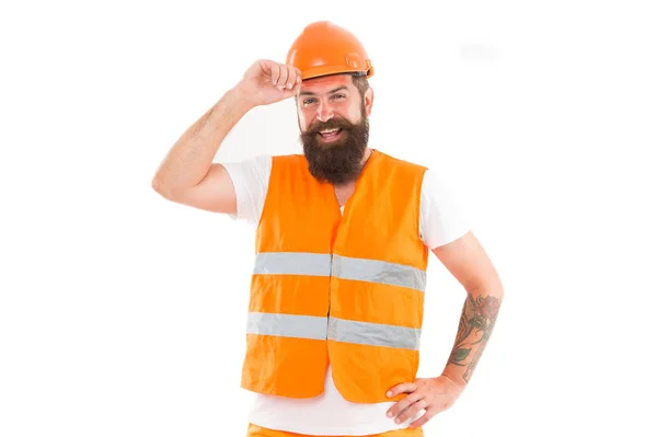 Sterke knappe bouwer. Het creëren van solide fundamenten. Man beschermende harde hoed en uniforme witte achtergrond. Werknemer bouwer zelfverzekerd en succesvol. Het concept van beschermende uitrusting. Bouwer geniet van succes — Stockfoto