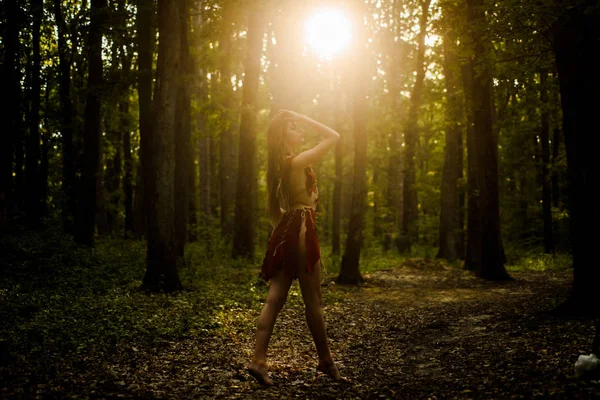 Folklore character. Living wild life untouched nature. Sexy girl. Wild human. Wilderness of virgin woods. Female spirit mythology. She belongs tribe warrior women. Wild attractive woman in forest