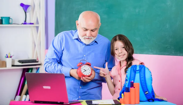 Little girl man tutor study. Back to school. Teacher help schoolgirl. Study digital science. Time to study. Beginning of lesson. Study online lesson. Pedagogue friendly kind. Punctual pedagogue — Stock Photo, Image