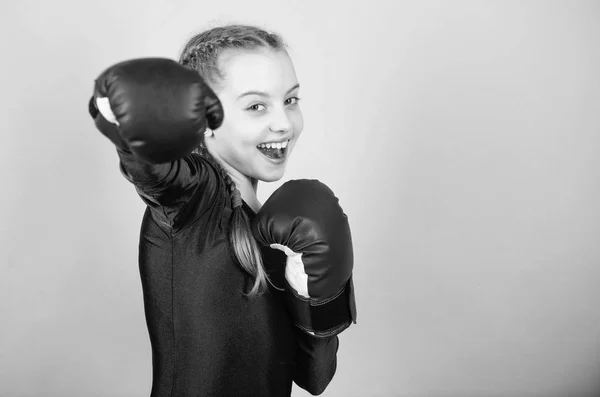 Feminism concept. With great power comes great responsibility. Boxer child in boxing gloves. Girl cute boxer on blue background. Rise of women boxers. Female boxer change attitudes within sport — Stock Photo, Image