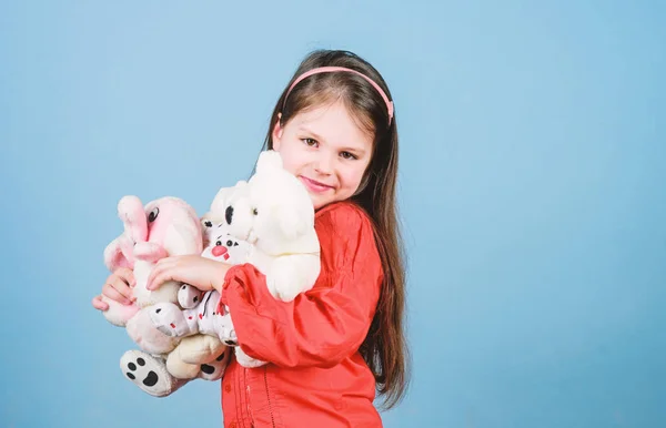 small girl with soft bear toy. child psychology little girl play game in playroom. happy childhood. Birthday. hugging teddy bear. toy shop. childrens day. Best friend. Moments of love and happiness