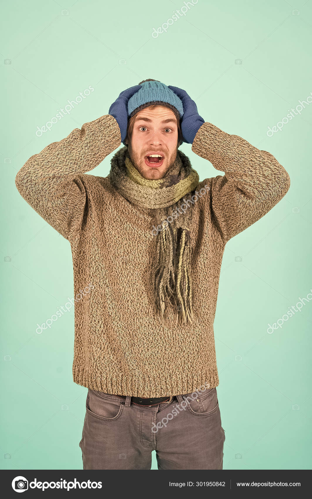 Knitted accessories as hat and scarf. Winter fashion knitted clothes. Man  knitted hat gloves and scarf winter fashion. Man wear knitted accessory  turquoise background. Winter accessories concept Stock Photo by ©stetsik  301950842