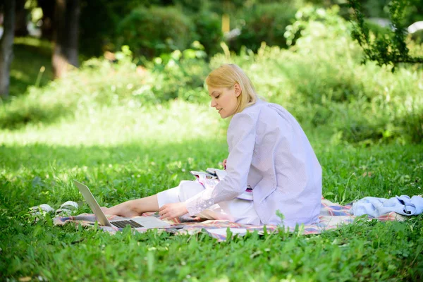 Business lady freelance work outdoors. Freelance career concept. Guide starting freelance career. Managing business outdoors. Woman with laptop sit grass meadow. Become successful freelancer
