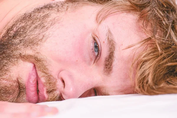 Man unshaven bearded face sleep relax or just wake up. Guy bearded macho relax in morning. Man attractive macho relax and feel comfortable. Simple tips to improve your sleep. Total relax concept