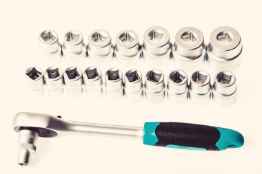 Soket anahtarı somun ratchet yakın için pzt. Ratchet Anahtarı. Ratchet aracı. Çelik kaymadan sıkıca tutun hiçbir kızak dişli kolu yaptı. Evrensel soket setleri. Ulaşılması zor yerlerde kullanılabilir