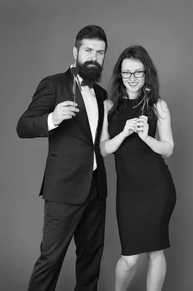 formal couple. business meeting. tuxedo man and formal woman at formal party. sexy couple in love. valentines day heart. bearded businessman with formal lady. love date and romance. business couple