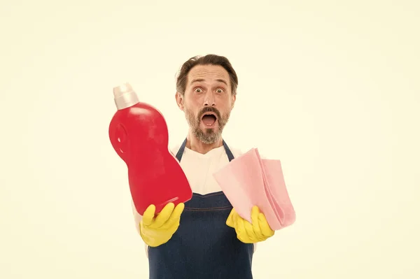 Get rid of stains. Cleaning tricks and tips. Cleaning service and household duty. Man in rubber gloves hold bottle liquid soap chemical cleaning agent. Bearded guy cleaning home. Cleanup concept — Stock Photo, Image