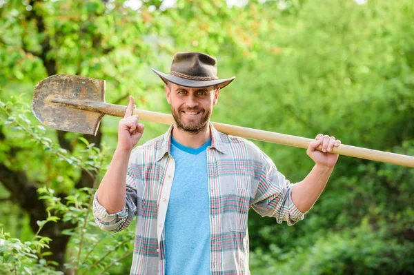 happy earth day. Eco living. farming and agriculture cultivation. Garden equipment. muscular ranch man in cowboy hat. sexy farmer hold shovel. Eco farm. Harvest. Living a green life