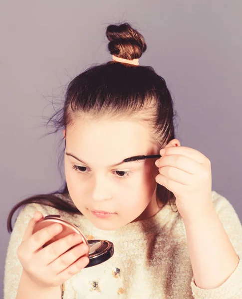 Salon and beauty treatment. Makeup store. Child little girl make up face close up. Pretty girl. Fashion and style. Creativity is best makeup skill. Make up school. Art of makeup. Femininity concept