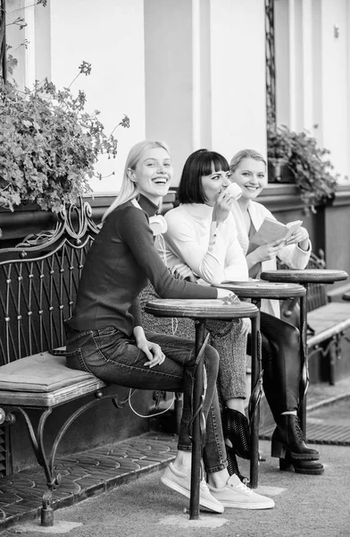 Group pretty women terrace entertain themselves with reading and listening. Coffee cafe. Way to relax and recharge. Female leisure. Hobby and leisure. Different interests. Weekend relax and leisure — Stock Photo, Image