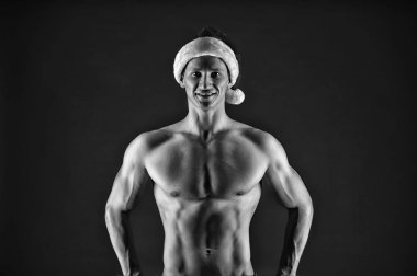 Mutlu kış tatili. Kırmızı. Noel için hediye. Noel alışveriş. Noel Baba şapkası seksi kaslı adam. Yeni yıl partisi. Noel Baba adam. Kusursuz bir beden. Yeni yıl partisi. Mutlu yıllar sana