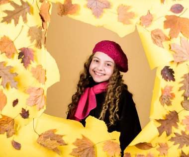 Kid girl wear coat. Girl adorable fashionable fall coat. Romantic mood. Child wearing warm coat or jacket fallen leaves background. Autumn outfit. Enjoy autumn day. Fashion store shop. Buy clothes