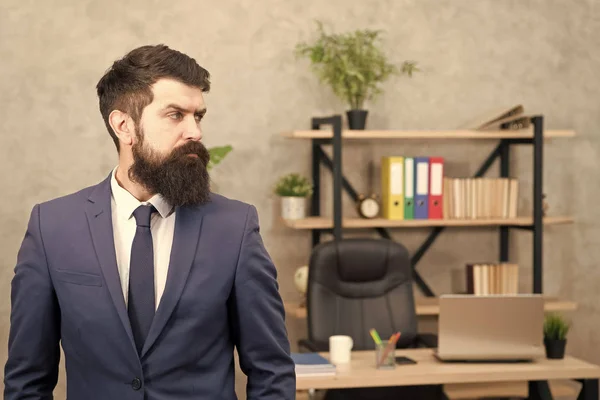 Man bearded serious office background. Provide consultation to management on strategic staffing plans. Office staff. HR director. HR management. HR job description. Head of human resources department