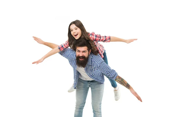 Parenthood fun. Fathers day. Fly high. Active game leisure concept. First flight. Father and daughter play planes game. Kid play game fly as plane with wide apart hands. Child enjoy game with dad