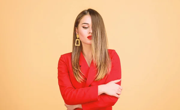 Cute and stylish. Fashion portrait of elegant woman. beauty and fashion. hair beauty and hairdresser salon. jewelry earrings. Girl in red jacket. Sexy woman with professional makeup — Stock Photo, Image