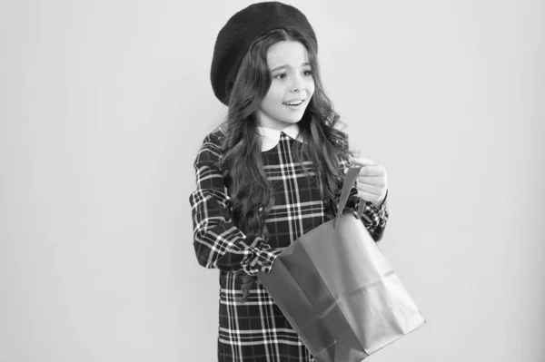 Little french lady adore shopping. Birthday girl. Favorite brands hottest trends. Girl with shopping bag. Explore fashion industry. Shopping and purchase. Black friday. Sale discount. Shopping day — Stock Photo, Image