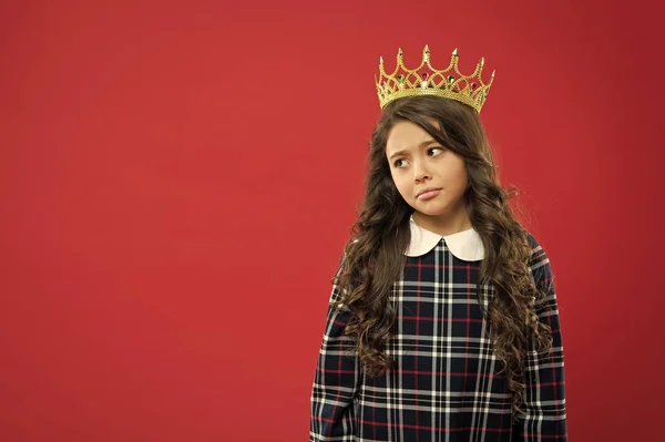 Princess manners. Girl wear crown red background. Monarch family concept. Monarch attribute. Kid wear golden crown symbol of princess. Every girl dreaming to become princess. Lady little princess