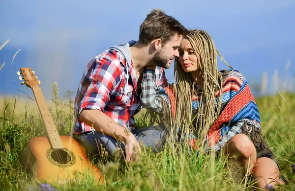 Love inspires them. Fresh air and pure feelings. Hiking romance. Beautiful romantic couple happy smiling faces nature background. Boyfriend and girlfriend with guitar. Romantic walk. Romantic song