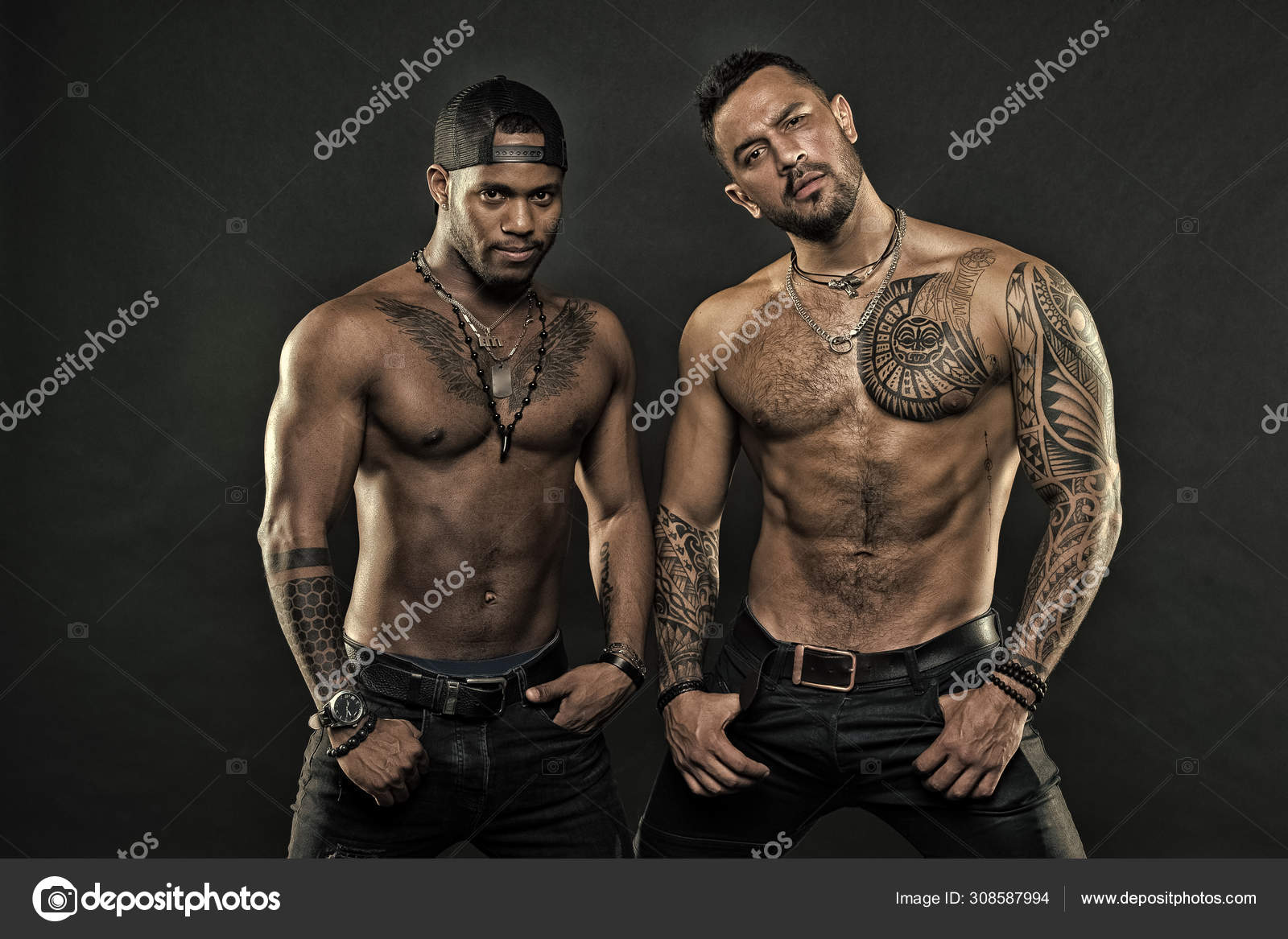 Men tattooed muscular body. Fashion models muscular chest. Sportsmen  muscular belly posing. Sport and bodycare. Muscular and masculine guys look  confident. African and hispanic men sexy bare torso Stock Photo by ©stetsik
