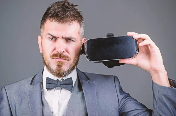 use future technology. Digital future and innovation. virtual reality goggles. Modern business. bearded man wear wireless VR glasses. businessman in VR headset. Visual reality. Using VR technologies