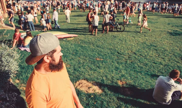 Open air concert. City day. Music festival. Book ticket now. Entertainment concept. Visit summer festival. Guy celebrate holiday or festival. Summer fest. Man bearded hipster in front of crowd